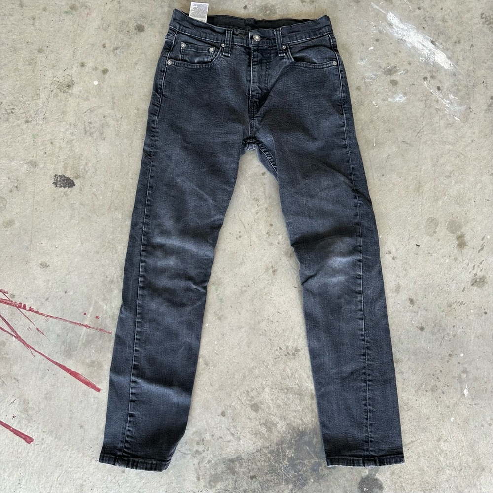 Vintage distressed light wash black Levi’s tag cut 511 size 30x32